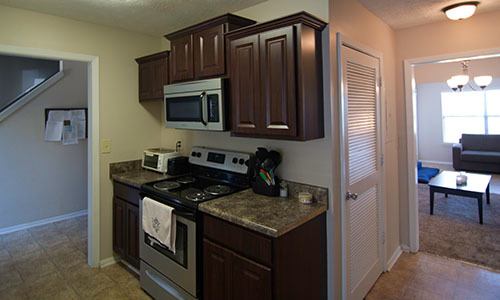 kitchen with dark wood cabinets